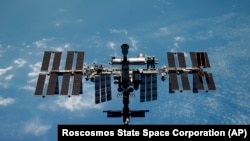 FILE - This undated photo released by the Roscosmos State Space Corporation shows the International Space Station. 