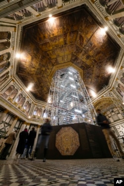 Visitors admire St. John's Baptistery, one of the oldest churches in Florence, central Italy, Feb. 7, 2023.