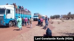 FILE: In an earlier relief effort, supply convoys are seen on February 13, 2022 in Arbinda, a town in northern Burkina Faso under blockade by jihadist groups.