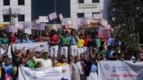 School students participate in an awareness walk to mark World Cancer Day in Hyderabad, India, Saturday, Feb. 4, 2023.