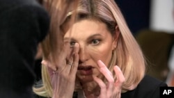 First Lady of Ukraine Olena Zelenska reacts at the World Economic Forum in Davos, Switzerland after the news of a helicopter crash in Ukraine, Jan. 18, 2023.