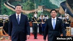 资料照：中国领导人习近平在北京人大会堂欢迎到访的菲律宾总统小马科斯。（2023年1月4日）