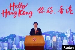 Kepala Eksekutif Hong Kong John Lee dalam peluncuran "Hello Hong Kong" untuk mempromosikan pariwisata kota di Hong Kong, 2 Februari 2023. (REUTERS/Tyrone Siu)