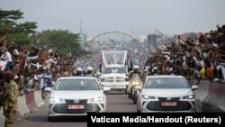 Pope Francis is welcomed by residents of Kinshasa, on his apostolic journey, in Kinshasa, Democratic Republic of Congo, Jan. 31, 2023. 