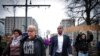 Memphis City Councilman JB Smiley Jr., center, marches with local activists demanding justice for Tyre Nichols, who died after being beaten by Memphis police during a traffic stop, in Memphis, Tenn., on Jan. 28, 2023. 