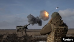 FILE - A Ukrainian army artillery brigade fires a German howitzer Panzerhaubitze 2000 near Bakhmut, in Ukraine's Donetsk region, Feb. 5, 2023. 