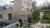 Israeli paramilitary border police stand next to the family home of a Palestinian gunman who killed several people in an attack on Friday outside a synagogue, in East Jerusalem, Jan. 29, 2023. 