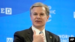 FBI Director Christopher Wray talks at the World Economic Forum in Davos, Switzerland, Jan. 19, 2023. 
