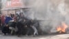 Palestinians clash with Israeli forces following an army raid in the West Bank city of Jenin, Jan. 26, 2023. Israeli forces killed at least nine Palestinians, including a 60-year-old woman, and wounded several others during a raid.