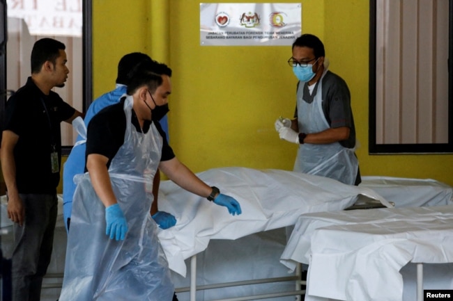 Dead body of a Batang Kali landslide victim is seen at Kuala Lumpur Hospital's mortuary in Kuala Lumpur, Malaysia, Dec. 16, 2022.