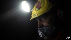 Coal miner Jonny Sandvoll works at the bottom of the Gruve 7 coal mine in Adventdalen, Norway, Jan. 9, 2023.