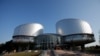 FILE - The building of the European Court of Human Rights is seen in Strasbourg, France, Sept. 11, 2019. 