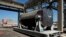 FILE - An empty nuclear fuel tank is seen after treatment at the Areva Nuclear Plant of La Hague, near Cherbourg, western France, April 22, 2015. 