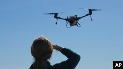 FILE - U.S. support for Ukraine has included supplying drones, such as this one in flight on the outskirts of Kyiv, Ukraine, Oct. 6, 2022.