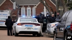 Members of the Memphis Police Department work a crime scene, in Memphis, Tennessee, Jan. 24, 2023.