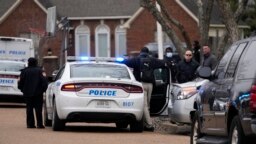 Members of the Memphis Police Department work a crime scene, in Memphis, Tennessee, Jan. 24, 2023.