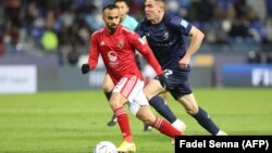 Le milieu de terrain égyptien d'Ahly, Mohamed Afsha, lors du match du premier tour de la Coupe du Monde des Clubs de la FIFA entre l'équipe égyptienne d'Al-Ahly et l'équipe néo-zélandaise d'Auckland City, au stade Ibn Batouta de Tanger, au Maroc, le 1er février 2023.