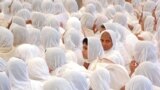 FILE - Hundreds of Jain nuns take part in the inauguration prayers of the 27 day long religious celebration of the Smrutimandir Temple in Ahmadabad, India Thursday Jan 31, 2002. 
