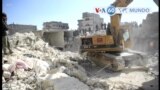 Manchetes mundo 23 janeiro: Socorristas vasculharam os escombros de um edifício desabado em Alepo, Síria