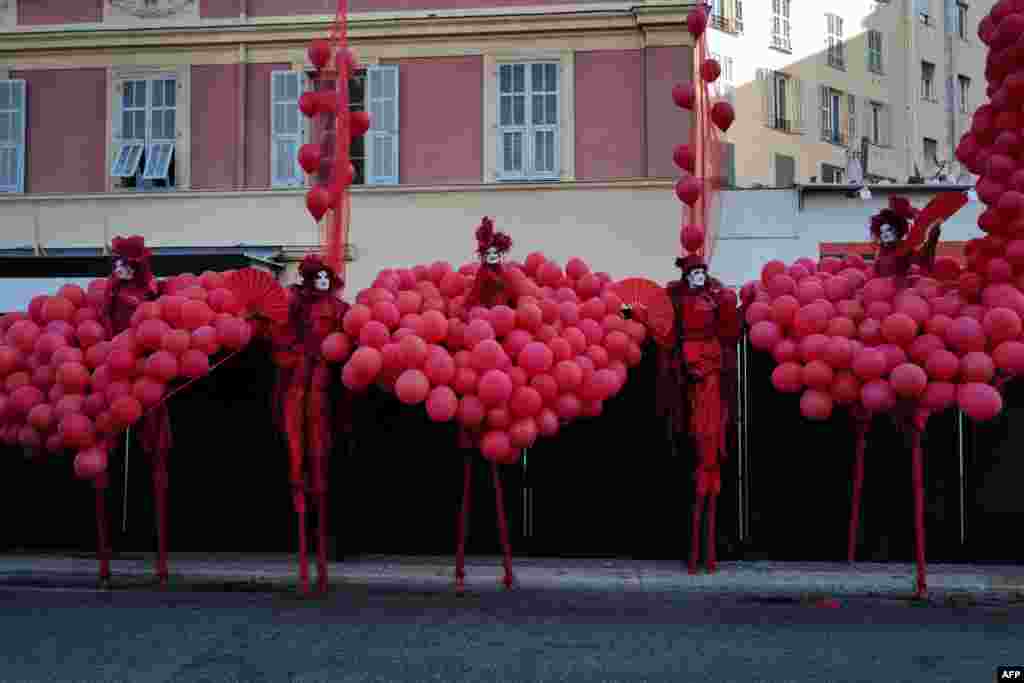 Artists perform during the 150th Nice Carnival parade in Nice, southeastern France.