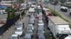 FILE - Motorists queue in a traffic gridlock in Lagos, on May 4, 2020.