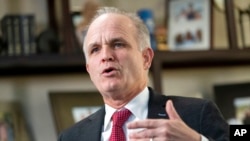 Avokati John F. Carman