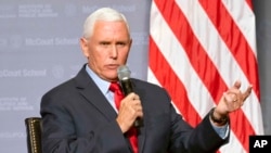 FILE - Former Vice President Mike Pence speaks to students at Georgetown University in Washington, Oct. 19, 2022. 