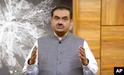 FILE - This grab from video released by Adani Enterprises Ltd. on Feb.2, 2023, shows Indian billionaire Gautam Adani addressing investors from an unknown location.