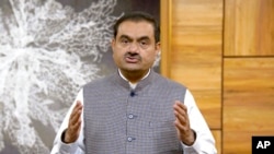 This grab from video released by Adani Enterprises Ltd. on Feb.2, 2023 shows Indian billionaire Gautam Adani addressing investors from an unknown location. 