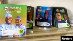 Branded notebooks with images of Nigerian presidential candidates are displayed at a shopping center in Abuja, Nigeria, Feb. 2, 2023.