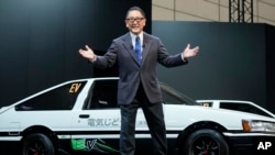 FILE - Toyota CEO Akio Toyoda at the Tokyo Auto Salon on Jan. 13, 2023, in Chiba near Tokyo. Toyoda announced Thursday that he will step down from his position and transition to be chairman of the board on April 1. Toyota's chief branding officer, Koji Sato, will replace him.