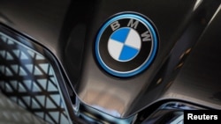 FILE - A BMW car logo is displayed during a media tour at the plant of German automaker BMW in San Luis Potosi, Mexico, Feb. 3, 2023.