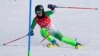 FILE - Atefeh Ahmadi, of Iran competes in the first run of the women's slalom at the 2022 Winter Olympics, Feb. 9, 2022, in the Yanqing district of Beijing. 