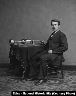 This photograph shows a young Edison with his phonograph (2nd model), taken in renowned Civil War photographer Mathew Brady's Washington, DC studio in April 1878.