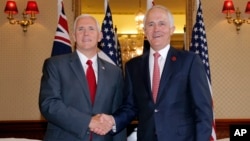 U.S. Vice President Mike Pence (left) shakes hands with Australia's Prime Minister Malcolm Turnbull at Admiralty House in Sydney, April 22, 2017.