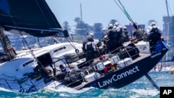 LawConnect competes at the start of the Sydney-to-Hobart yacht race in Sydney Harbor, Dec. 26, 2024.