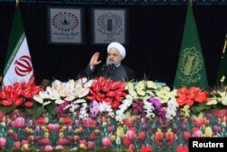 Iran's President Hassan Rouhani speaks during a ceremony to mark the 40th anniversary of the Islamic Revolution in Tehran, Feb. 11, 2019. (H. Zohrevand/Tasnim News Agency/via Reuters)