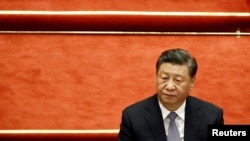 中國領導人習近平在北京人大會堂舉行的全國政協十三屆五次會議開幕式上。 （2022年3月4日）