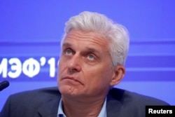 FILE - Oleg Tinkov, Chairman of the Board of Directors of Tinkoff Bank, attends a session of the St. Petersburg International Economic Forum (SPIEF), Russia, June 7, 2019.