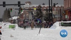 Horses Pull Skiers in Race Through Obstacle Course During Colorado Festival 