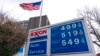 FILE - A sign with gas prices is pictured at an Exxon station in the Capitol Hill neighborhood of Washington, March 7, 2022.
