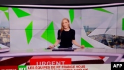 This picture taken on March 2, 2022, in Paris, France, shows RT France network last live emission due to a European Union decision after the Russia's invasion of Ukraine. The French version of the Russian media RT is no longer broadcast on television in France.