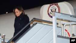 U.S. Vice President Kamala Harris disembarks from Air Force Two upon arrival at Warsaw Chopin Airport in Warsaw, Poland, March 9, 2022.