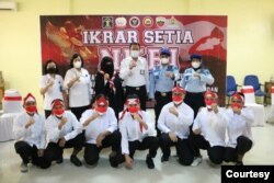 Delapan narapidana terorisme di Sumatra Utara yang berikrar setia kepada NKRI. Rabu 9 Maret 2022. (Courtesy: Humas Kemenkumham Sumut)