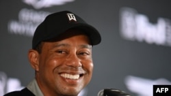 FILE - Genesis Invitational host Tiger Woods speaks at a press conference ahead of the PGA Tour golf tournament at the Riviera Country Club in Los Angeles, California, on Feb. 16, 2022.