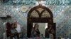 file - Women pray in a mosque in Rawalpindi, the neighbor city of Islamabad, Pakistan September 30, 2021.