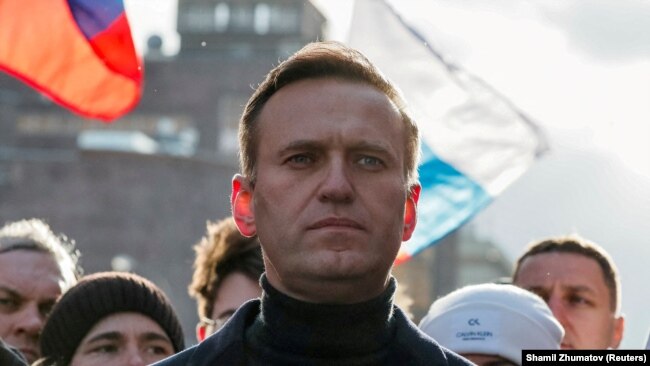 FILE - Alexei Navalny takes part in a rally to mark the 5th anniversary of opposition politician Boris Nemtsov's murder and to protest against proposed amendments to the country's constitution, in Moscow, Russia February 29, 2020. (REUTERS/Shamil Zhumatov/File)