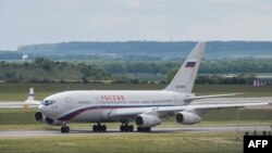 FILE: An Ilyushin Il-96 plane of the Russian government leaves the Vaclav Havel airport in Prague, May 29, 2021.