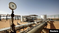 FILE - A general view of the El Sharara oilfield, Libya.