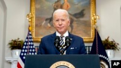 US President Joe Biden pauses while announcing a ban on Russian oil imports, toughening the toll on Russia's economy in retaliation for its invasion of Ukraine, March 8, 2022.